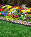 Tall Wall No Dig Landscape Edging Kit around colorful garden with rocks, flexible recycled plastic, quick install, all soil types.