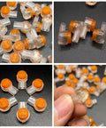 50 Pack UY2 K2 Gel Filled Waterproof IDC Wire Splice Connectors for 26-29 AWG wires, clear with orange top, close-up