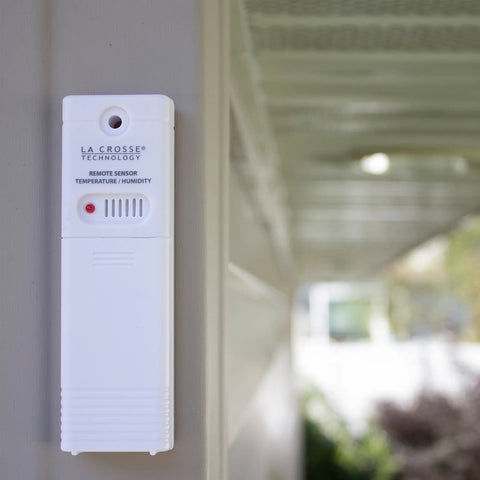 Wireless Outdoor Temperature and Humidity Sensor With Wall Mount Weather Resistant Gauge 330 Feet Transmission Range Battery Powered For Accurate Readings in Your No Fuss Home Weather Station installed on wall