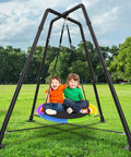 Sturdy Heavy Duty Swing Frame Stand For Kids And Adults Up To 330 Lbs Fits Most Swings For Indoor And Outdoor Use Ground Stakes For Extra Stability Black Backyard Ready All Weather with two children playing