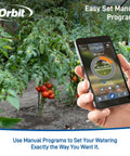 Smart Hose Watering Timer With Auto Scheduling For Gardens app interface controlling garden watering with orange tomatoes