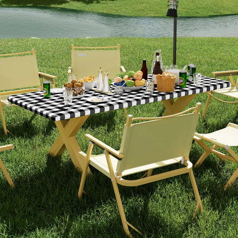 Waterproof Elastic Fitted 6Ft Picnic Table Cloth 2 Pack Buffalo Plaid Black White 30x72 Inches For Outdoor Dining on table with food.