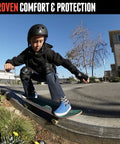 Skating with Knee Pads For Skaters And Snowboarders Kickin Comfort with ventilated EVA foam impact protection, black, one size fits most.