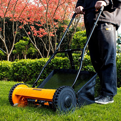 Person using 16 Inch 5 Blade Push Reel Lawn Mower with Removable Seven Point Nine Gallon Grass Catcher Sponge Grip