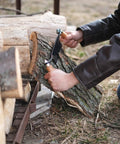 User demonstrating Heavy Duty Eight Inch Curved Draw Shave Tool Hog Out Logs And Peel Bark Fast Durable Carbon Steel Edge.