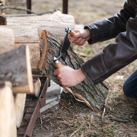 User demonstrating Heavy Duty Eight Inch Curved Draw Shave Tool Hog Out Logs And Peel Bark Fast Durable Carbon Steel Edge.