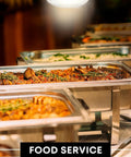 Buffet dishes under heat lamps for food service, showing use of 250 Watt R40 Heat Lamp Bulbs Pack Of 2 Clear Incandescent Reflector Lamps