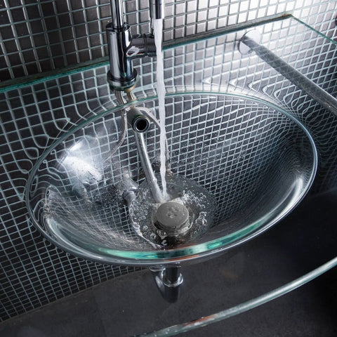 Glass sink with gray Hair Catcher Drain Protectors Bundle for Bathtubs and Sinks keeps drains flowing smoothly, preventing clogs.