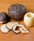 Five Piece Tagua Nut Set For Woodturning And Carving, 1 3/8 To 1 3/4 Inch Diameter, Bag Of Five, shown carved and uncarved