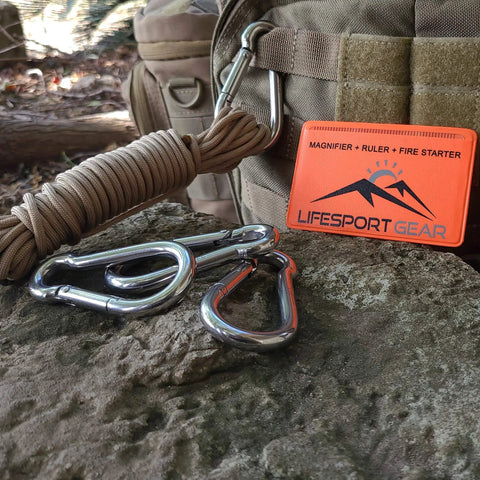 Heavy Duty 316 Stainless Steel Carabiners 3 Inch Spring Snap Hooks for Gym and Outdoor Use, shown with camping gear.