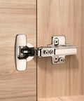 Frameless full-overlay soft-close cabinet hinge, clip-on stainless steel, 45–110° opening, installed on cabinet door