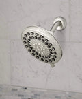 Six-Mode RainFall Plus Rain Shower Head With PowerPulse Massage, Brushed Nickel Finish, mounted on marble wall