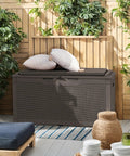 98 Gallon Waterproof Resin Deck Box With Cushion Lockable Outdoor Storage Bench in deep brown on patio