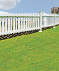 White picket fence supported by Expanding Foam Post Hole Filler Kit For Fence Posts And Deck Anchors 2 Part Polyurethane Concrete Alternative