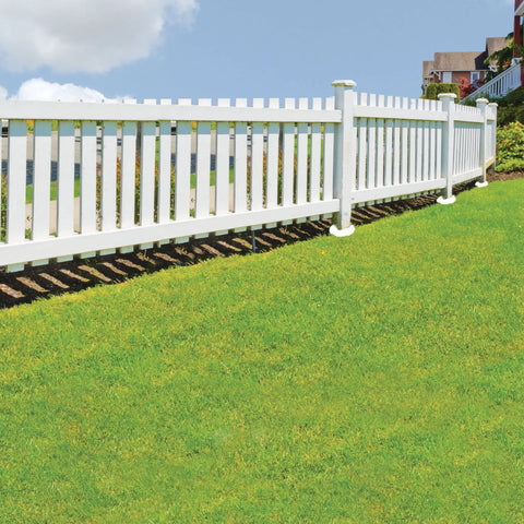 White picket fence supported by Expanding Foam Post Hole Filler Kit For Fence Posts And Deck Anchors 2 Part Polyurethane Concrete Alternative