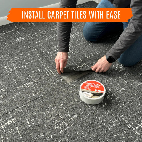 Person using Double Sided Carpet Tile Tape 2 In By 90 Ft Heavy Duty With Reinforced Web Mesh Residue Free Indoor Outdoor For Carpet Tiles.