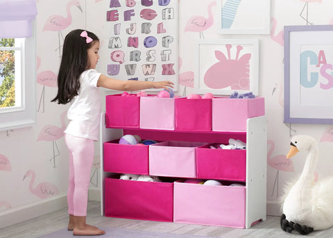 Child using Deluxe Multi Bin Toy Organizer With 9 Bins In White And Pink For Toddlers Ages 3 To 6 Kid Friendly Design Easy Assembly