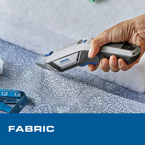 Dremel 4V Cordless Electric Scissors With USB Rechargeable Battery And Two Sharp Hssc Blades For Cutting Cardboard Fabric And Paper Effortlessly Ideal For Home Diy Tasks And Crafting Projects Made Easy In One Hand, cutting patterned fabric.