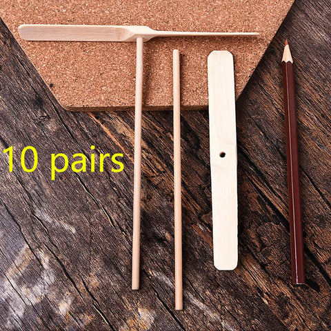 Dragonfly Propeller Toys Set For Outdoor Fun, 10 Pack Wooden Flying Dragonflies shown with pencils for scale.