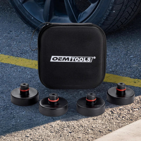 Tesla Jack Pads For Model Y, 3, S, X Rubber Lift Pads With Storage Bag on pavement near car tire
