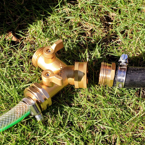 Solid Brass Garden Hose Repair Kit With Stainless Steel Clamps, Male Adapter, Female Swivel Fitting, 5/8 Barb X 3/4 Female, Includes Rubber Gasket And PTFE Seal Tape, Two Sets. Brass hose repair fitting on grass