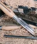 Cryo Treated M2 High Speed Steel Roughing Gouge Three Quarter Inch in shavings with beech handle and stainless bolster.