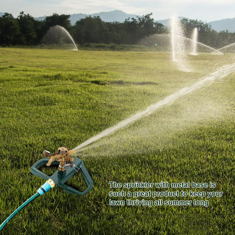 Pulsating Impact Sprinkler With Metal Base For Yard And Garden in action on a green lawn, showcasing the Brass Sprinkler Head.