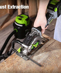 WORKPRO 20V cordless mini circular saw cutting OSB board; laser guide visible; green accents.