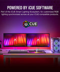 Desk setup with dual monitors, iCUE software branding, RGB lit PC case, keyboard, and headset, showcasing iCUE LS100 lighting.
