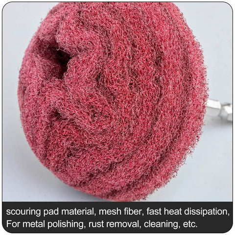 Close-up of red scouring pad from Six Piece Non Woven Abrasive Buffing And Polishing Wheel Drill Attachment Set on grey background.