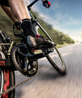 Cyclist using Assioma Duo Power Meter Pedal System With Rechargeable Batteries Delivers 50 Hours Of Ride Power on road bike