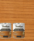 Fast Track Cedarwood Wood Stain For Home Updates One Pass Slick Protection Quick Cure two cans of cedarwood stain on wood background.