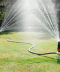 Heavy Duty Garden Watering Sprinkler System with Five Pattern Nozzle Metal Step Spike Gear Drive in action on lawn