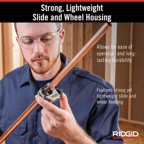 Man using Compact Auto Feed Tubing Cutter For Tight Spaces, 1/4 To 1-1/8 Inch Copper Aluminum Brass And Plastic Tubing on pipe