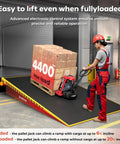 Heavy Duty Electric Pallet Jack Truck With 4400 Lb Capacity Featuring Extra 48V Lithium Battery For Quick Charging and Nonstop Warehouse Hustle Plus Powered Walkie Drive And Huge Forks loading boxes on incline ramp.