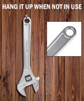 Heavy Duty 15 Inch Adjustable Wrench Built Tough With Drop Forged Steel, Chrome Plated Finish shown hanging on wooden wall.
