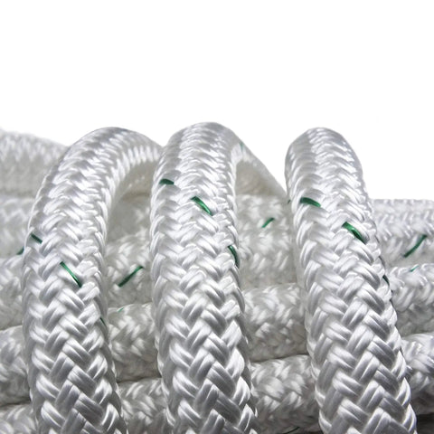 Close-up of durable white braided rope, part of the Deluxe Fiddle Block Kit with Anodized Aluminum UniBody Frame for tree pulling.