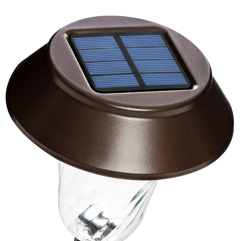 Close-up of Bronze Solar Path Light Set Of 6 With Glass Lens And Metal Ground Stakes Plus Super Bright LED for outdoor lighting.
