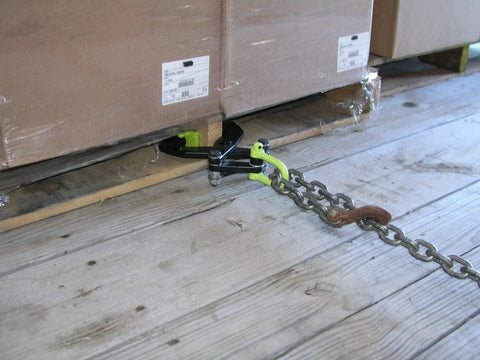 Beefy Pallet Puller With 3000 Pound Capacity For Tight Spaces Black Finish in action pulling pallet with spring-loaded clamp