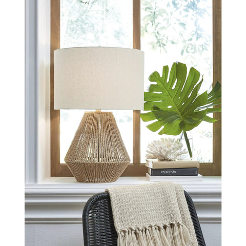 Boho Coastal Table Lamp With 23.5 Inch Paper Rope And Wood Base, Light Brown Finish next to window with tropical leaf decor