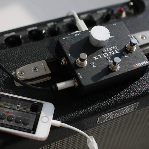 Xtone Ultra Low Latency Guitar Audio Interface with 192KHz Sampling Rate on amplifier with phone connection