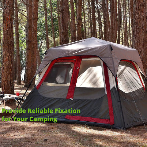 30 Pack Ball Bungee Cords 4 Inch Heavy Duty Tarp Ties securing a tent in a wooded campsite with green text overlay.