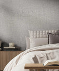 Bedroom with Grasscloth Peel And Stick Wallpaper Self Adhesive 15.7 Inch By 787.4 Inch Light Gray Faux Linen Vinyl Wall Cover behind bed