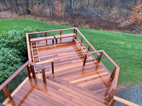 Wooden deck with cable railing using HandiSwage Flush Fittings For 1/8 Inch Cable 2 Pack Through Post Cable Railing Hardware.