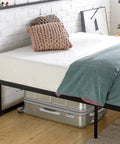 Queen Size Metal Platform Bed Frame With Reinforced Steel Slat Support And Absolutely No Box Spring Required No Sweat Assembly Heavy Duty Durable Mattress Foundation Built Like A Tank with mattress and decorative pillows.