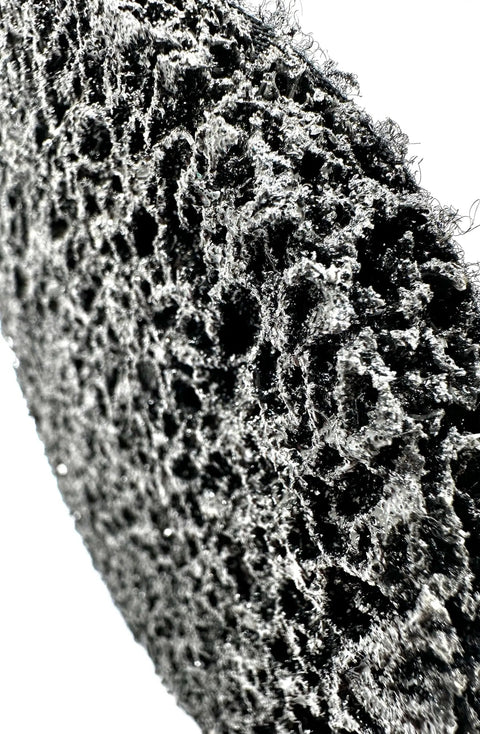 Detailed close-up of extra coarse silicon carbide coating removal disc from the 4 Piece Starter Kit With 7 Inch Silicon Carbide Coating Removal Discs