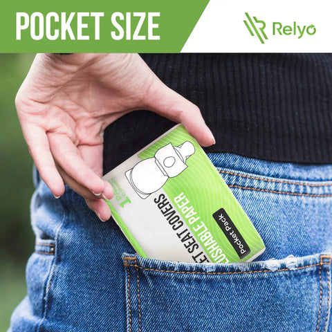 Flushable Toilet Seat Covers On The Go 50 Pack XL being placed in a pocket, showing compact size and portable packaging.
