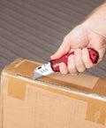 Retractable Utility Knife Set With Heavy Duty Razor Blade And 3 Extra Blades Refills, Built For Cardboard, Packages, Warehouse, Office, And Construction Jobs, Ergonomic Red Cutter For Quick, Clean Cuts, A Real Workhorse cutting taped cardboard box