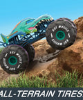 Mega-Wrex 1 To 6 Scale RC Monster Truck with all-terrain tires climbing rocky terrain, showing rugged offroad capability.