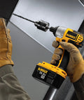 Impact Driver Drill Chuck With One Quarter Inch Quick Connect in use, all-metal build with gloved hand tightening for heavy duty use.